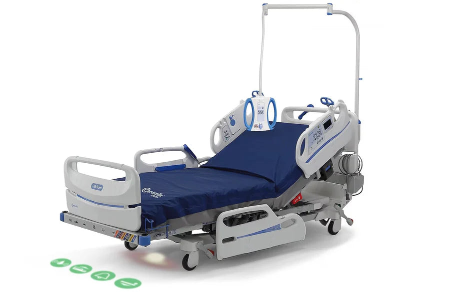 Hospital bed with various controls on a white background